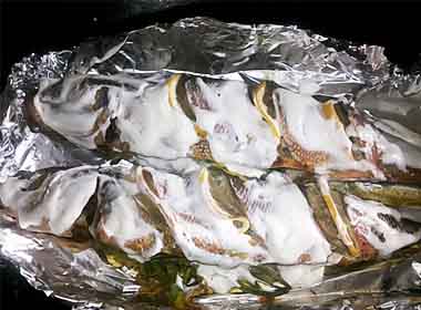 Риба запечена в духовці з овочами