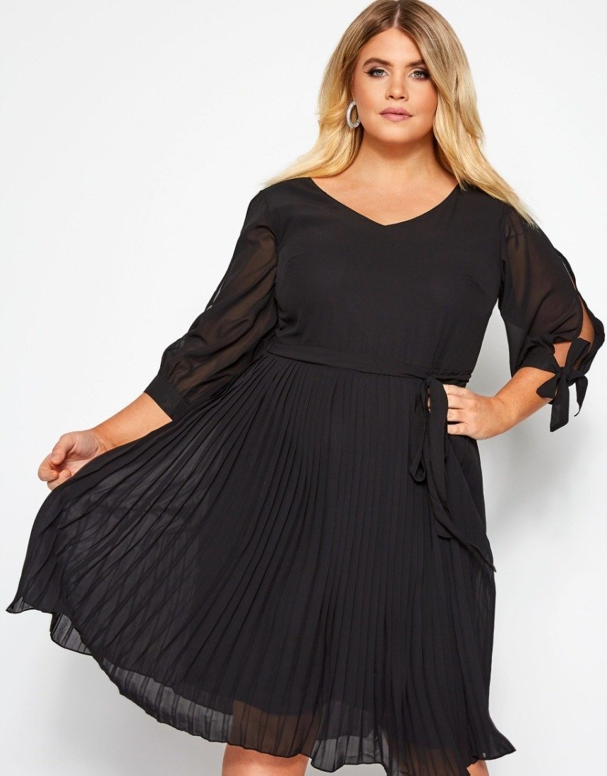 Модні сукні на новий рік 2023 для повних жінок, які стрункий