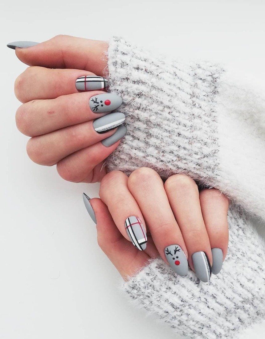 Манікюр на Новий рік 2023: дизайн та фото новорічних малюнків на нігтях.