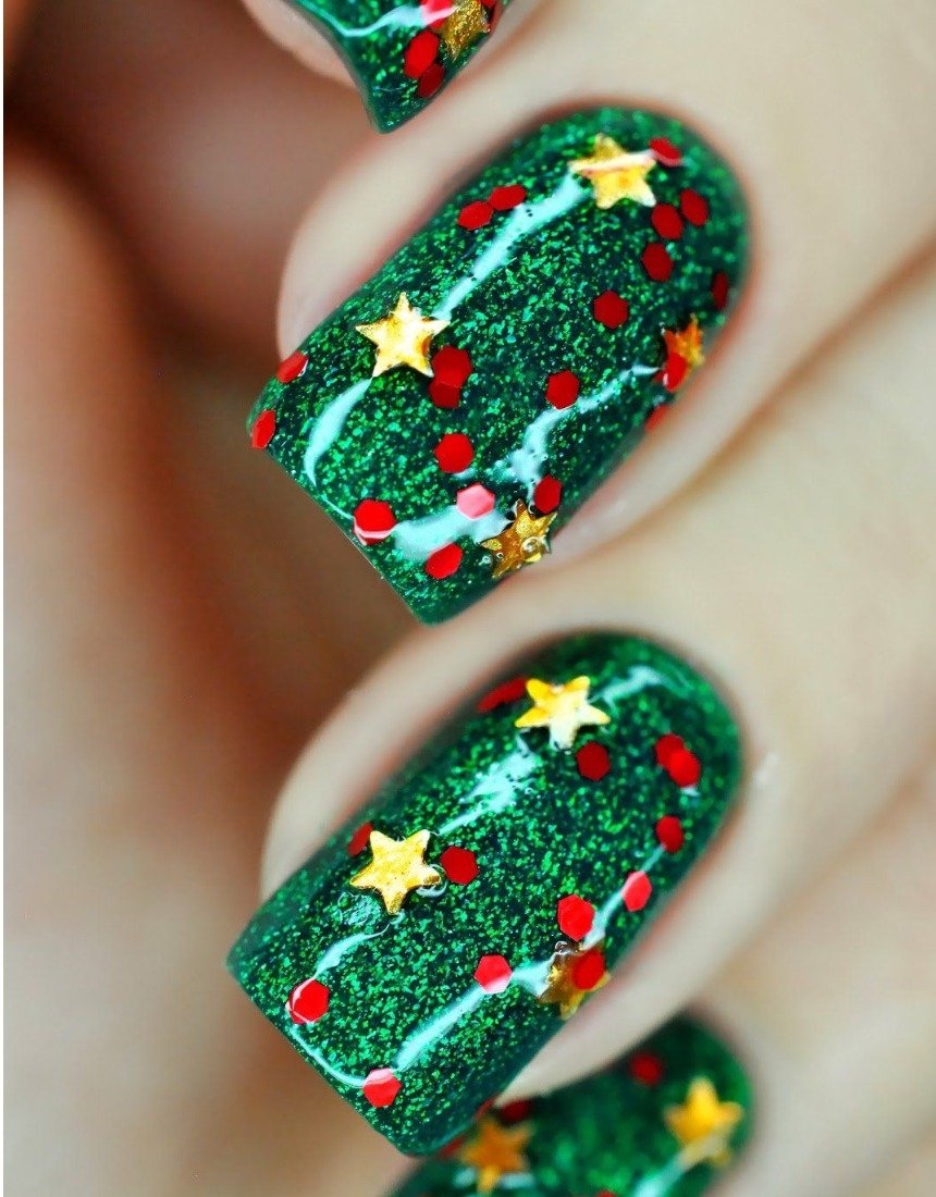 Манікюр на Новий рік 2023: дизайн та фото новорічних малюнків на нігтях.
