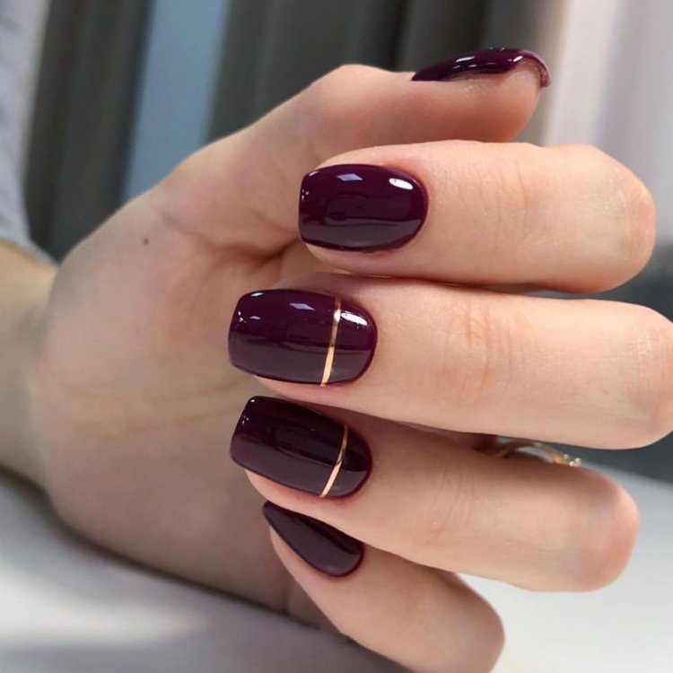 Темно вишневі нігті